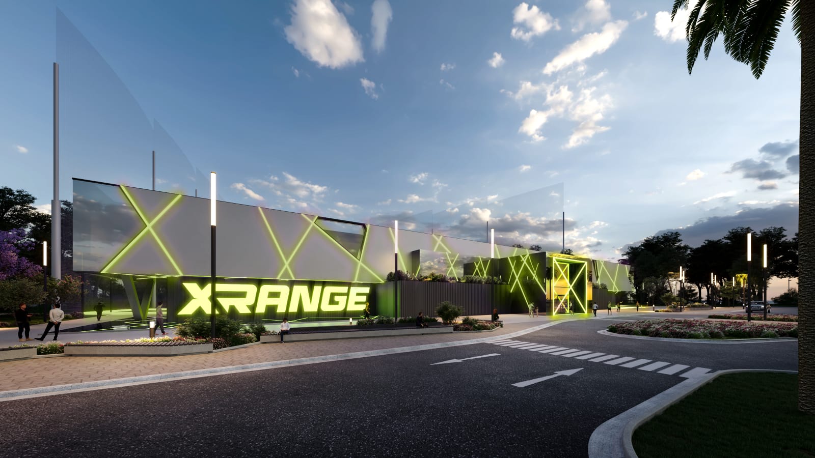 XRANGE seen from a road junction: a long low building with a mirrored upper storey lit by green X-frame lighting.